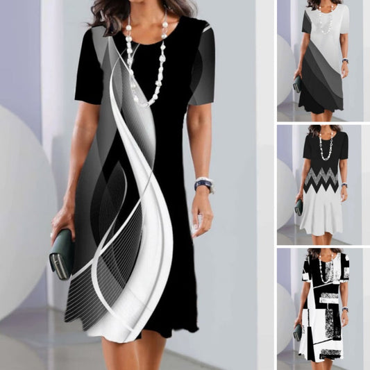 ✨Zomermode👗Lichte, slanke dames casual losse bloemen 3D digitaal bedrukte ronde hals jurken
